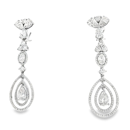 18k White Gold 12.68ctw Pear Oval and Round Brilliant Diamond Drop Earrings — right three-quarter angle