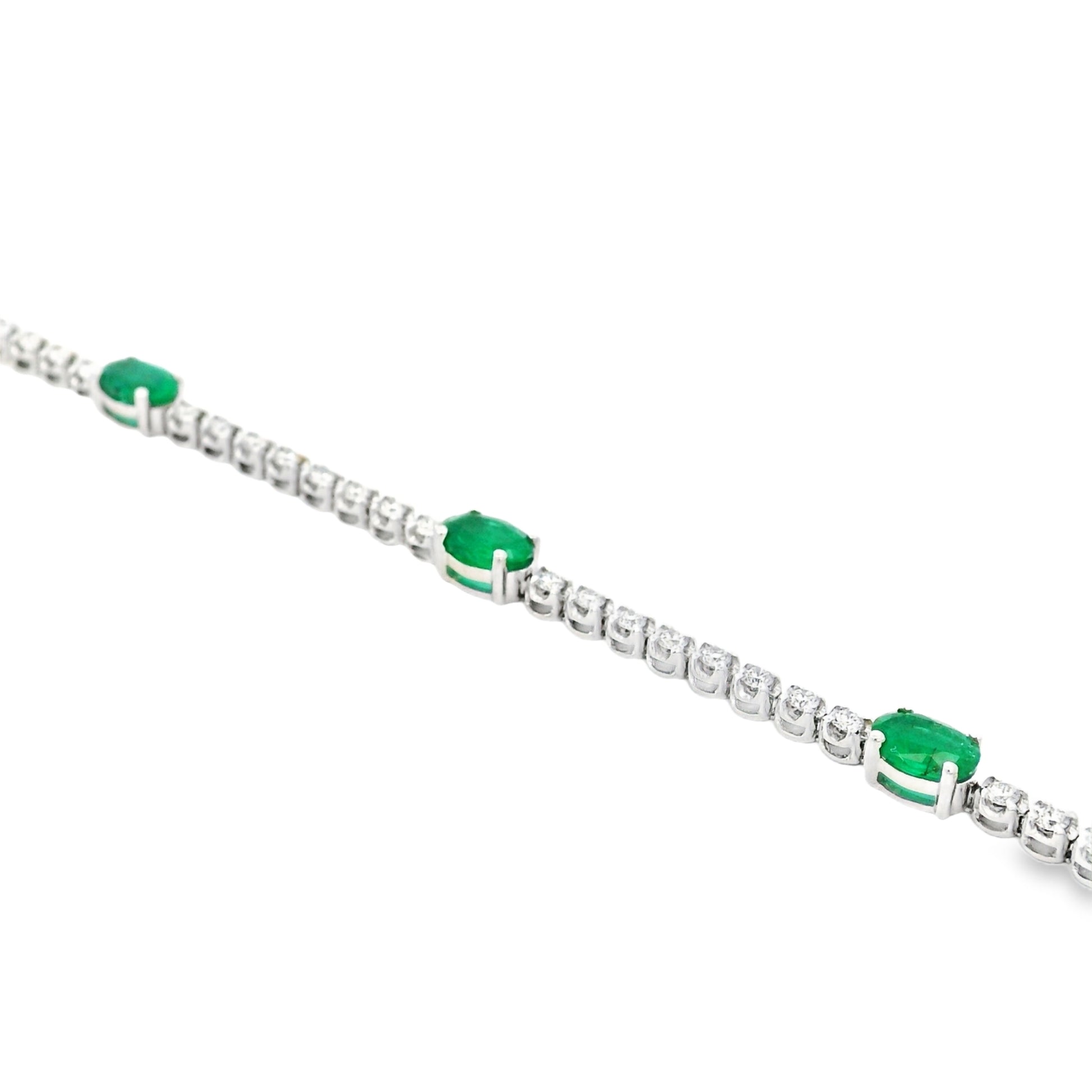 14k White Gold 5.88ctw Oval Emerald and Round Brilliant Diamond Tennis Bracelet — right three-quarter angle