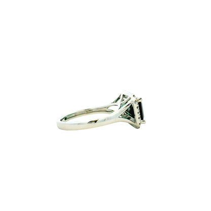 14k White Gold 3.54ct Emerald Cut Blue Tourmaline and 0.27ctw Diamond Halo Ring — right three-quarter angle