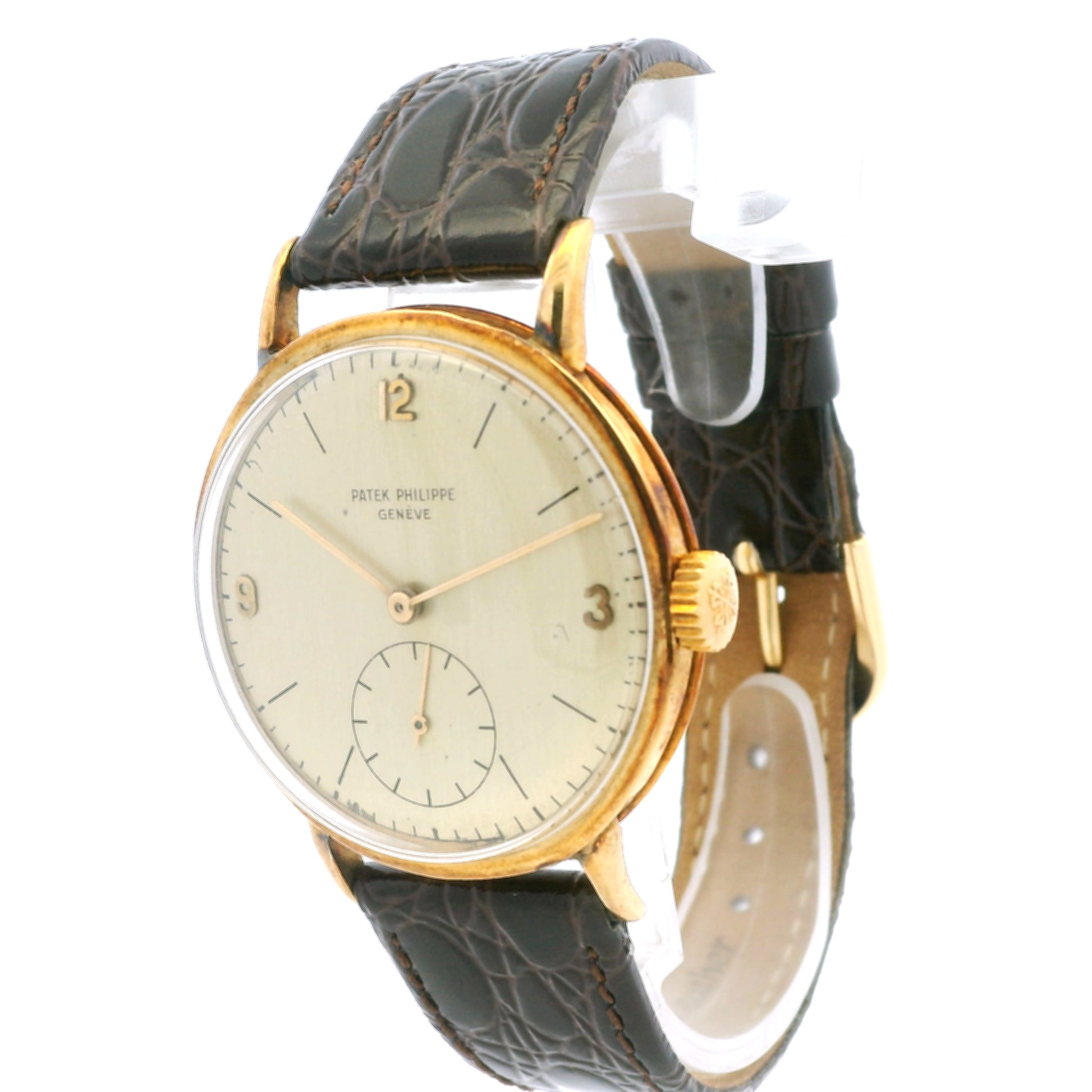 Patek Philippe Calatrava 18k Yellow Gold 35mm Champagne Dial Vintage Watch — right side three-quarter view