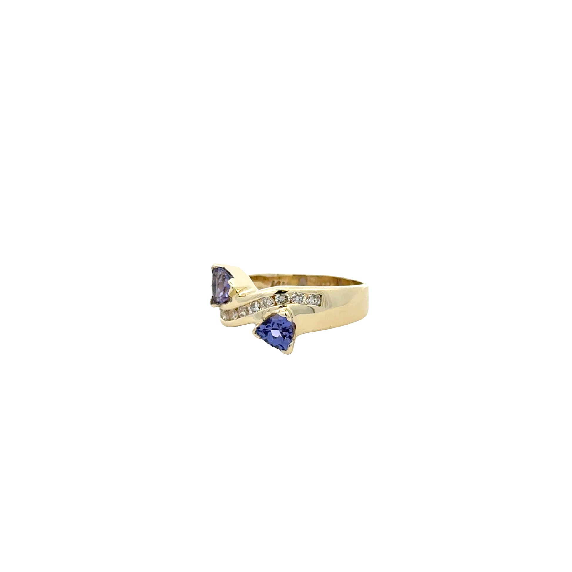 14k Yellow Gold Two-Stone Heart Tanzanite and 0.25ctw Diamond Ring — macro detail of the stones