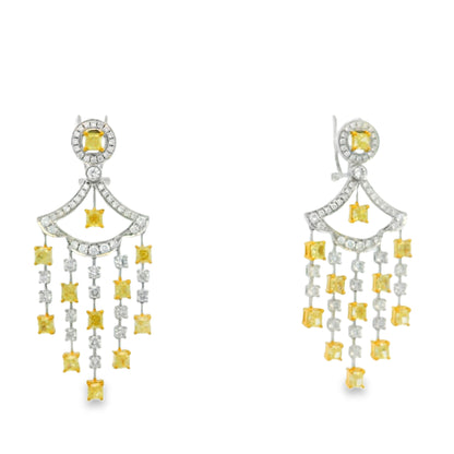 18k Two-Tone Gold 5.86ct Fancy Yellow and 2.71ctw Round Brilliant Diamond Dangle Earrings — macro detail of the stone