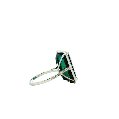 14k White Gold Blue Tourmaline and 0.34ctw Diamond Halo Ring — macro detail of the stones