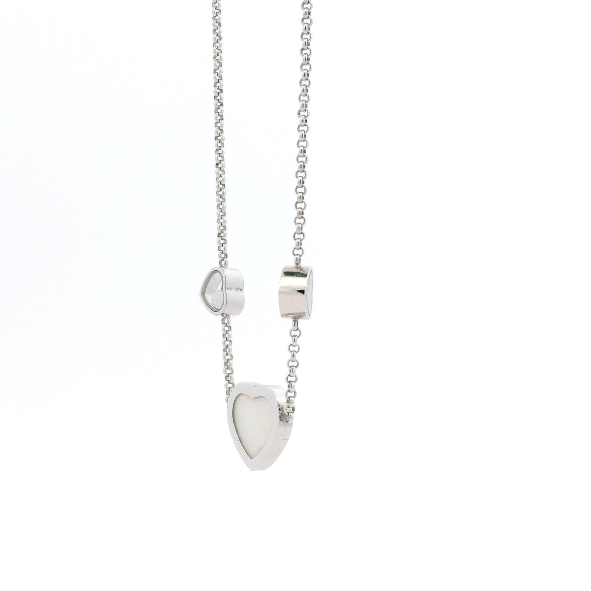 Chopard Happy Hearts 18k White Gold Diamond Mother of Pearl Heart Pendant Necklace — macro detail of the dial