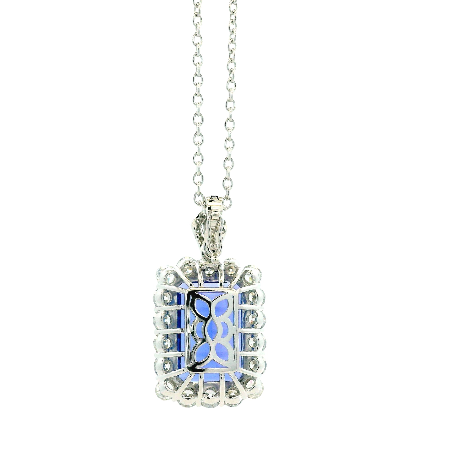 14k White Gold 13.50ct Emerald Cut Tanzanite & 2.54ctw Round Brilliant Diamond Halo… — macro detail of the centerpiece