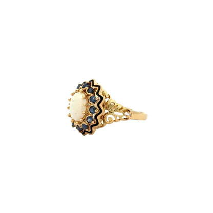 Vintage 18k Yellow Gold Opal and Blue Sapphire Halo Cocktail Ring — macro detail of the stones