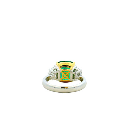 Platinum & 18k Yellow Gold 5.90ct Cushion Cut Vivid Green Emerald and Diamond Three-Stone Ring — macro detail of the stones