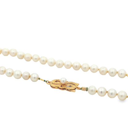 Mikimoto 18k Yellow Gold Akoya Pearl Strand Necklace 16" — macro detail of the dial