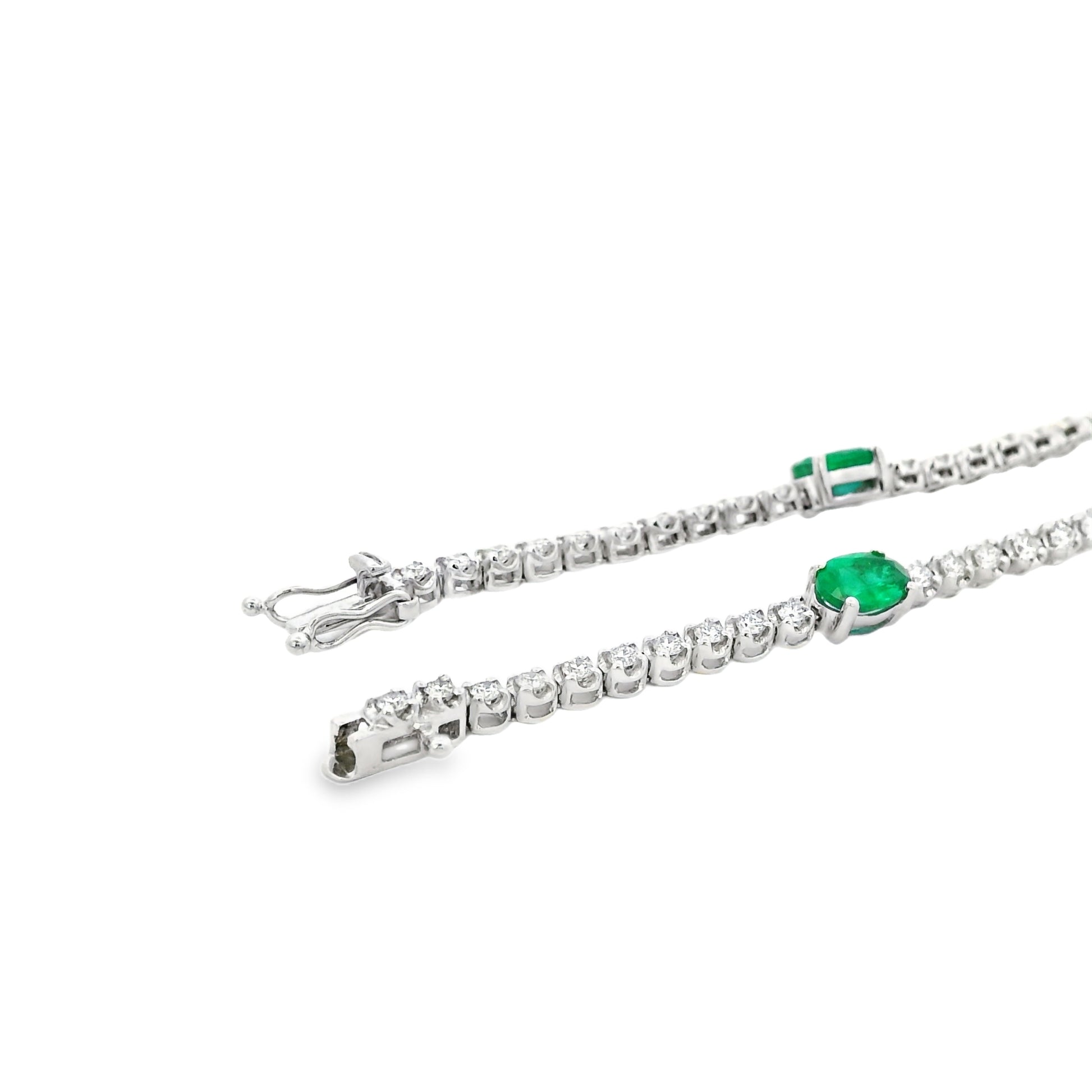 14k White Gold 5.88ctw Oval Emerald and Round Brilliant Diamond Tennis Bracelet — side profile
