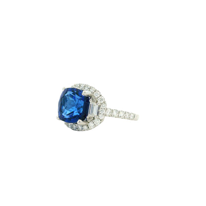 18k White Gold 8.45ct Cushion Cut Tanzanite and 1.55ctw Diamond Three-Stone Cocktail Ring — side profile showing the band