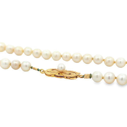Mikimoto 18k Yellow Gold Akoya Pearl Strand Necklace 16" — side profile showing case thickness