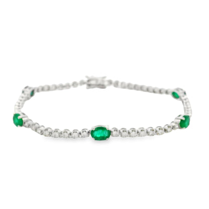 14k White Gold 5.88ctw Oval Emerald and Round Brilliant Diamond Tennis Bracelet — reverse view