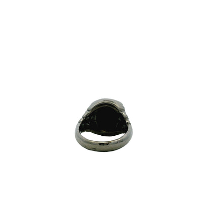 18k White Gold 1.50ct Oval Black Opal and 0.50ctw Pavé Diamond Ring — worn on the finger