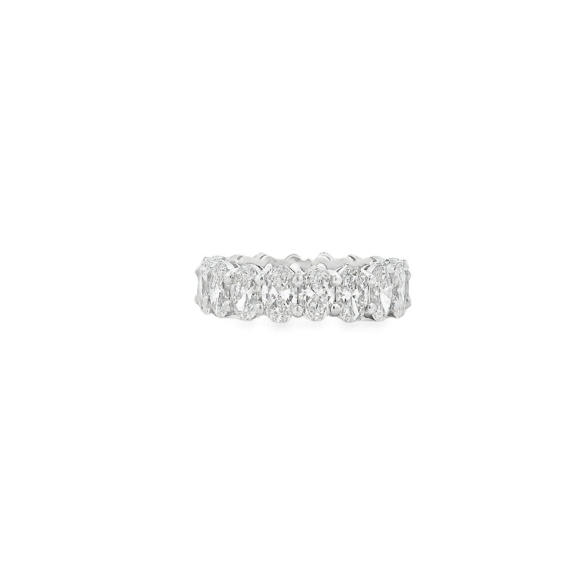 Platinum 5.66ctw Oval Cut Diamond Eternity Band Ring — worn on the finger