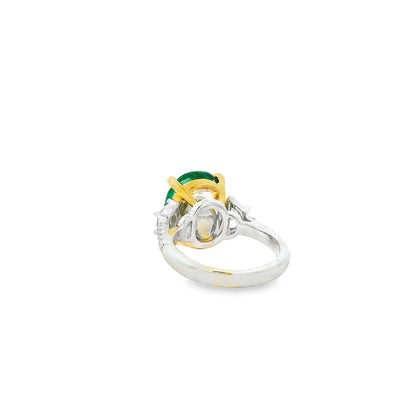 18k Two-Tone Gold 8.00ct Oval Cut Natural Emerald and 0.38ctw Diamond Ring — worn on the finger
