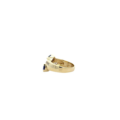 14k Yellow Gold Two-Stone Heart Tanzanite and 0.25ctw Diamond Ring — worn on the finger