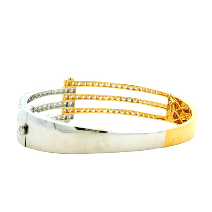 18k White and Yellow Gold 5.21ctw Round Brilliant Diamond Two-Tone Bangle Bracelet — worn on the wrist
