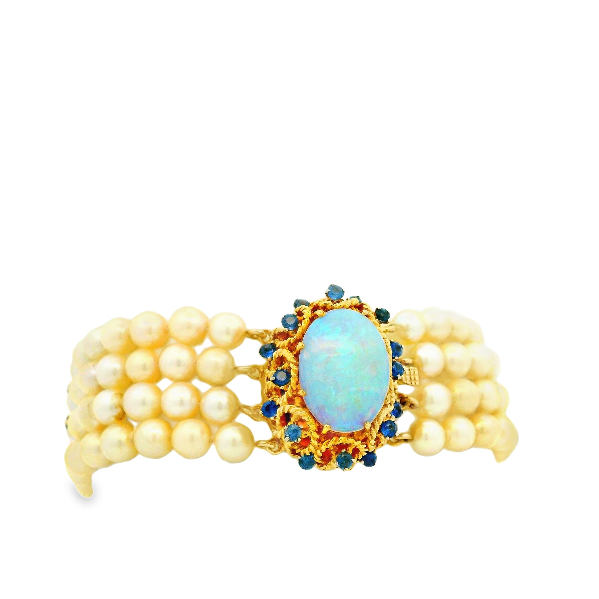 14k Yellow Gold 4-Strand Natural Pearl Bracelet with Opal and Natural Sapphire Cluster Centerpiece — worn on the finger