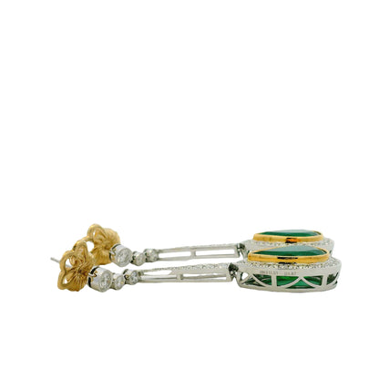 18k White Gold 11.51ct Emerald and 1.54ctw Round Brilliant Diamond Drop Earrings — worn on the ear