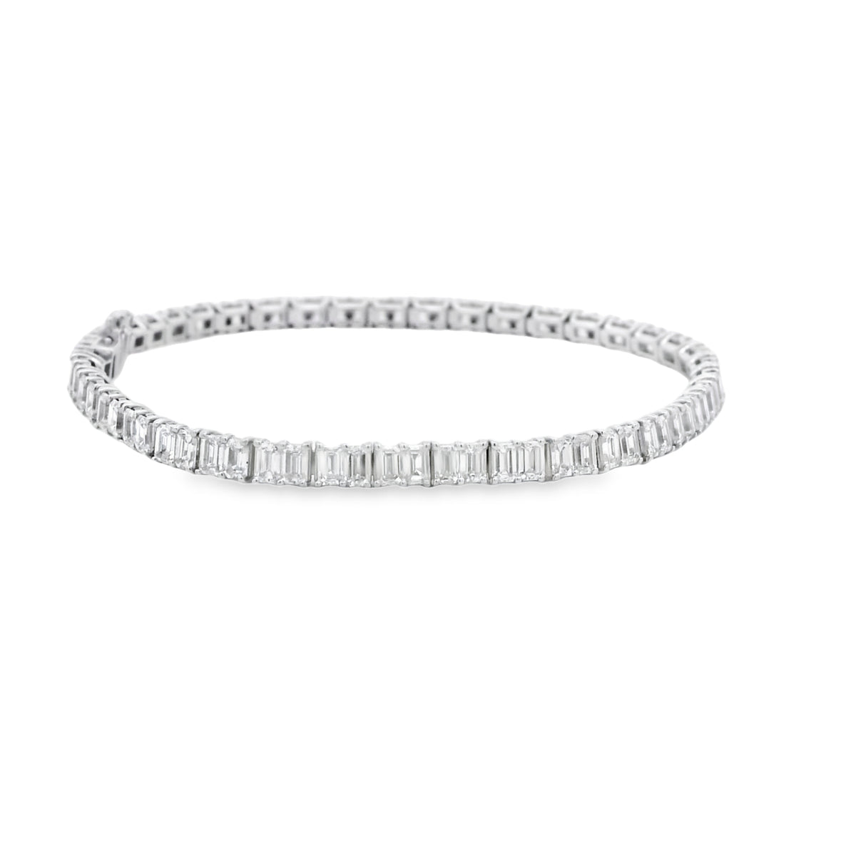 18k White Gold 6.80ctw Emerald Cut Diamond Tennis Bracelet — worn on the wrist