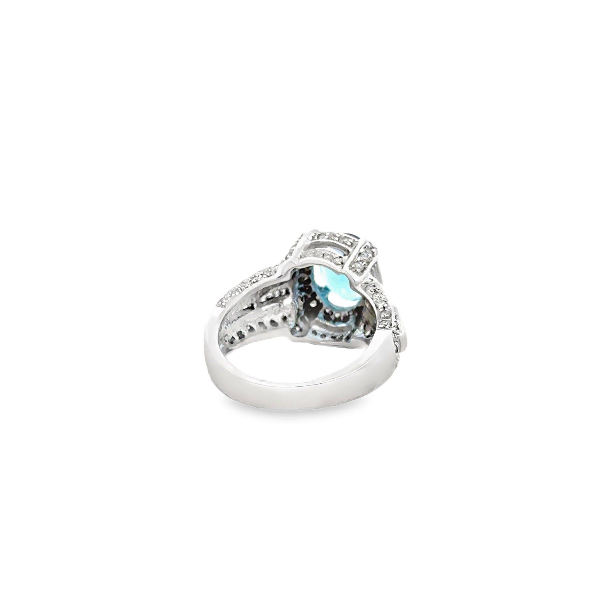 White Gold Oval Blue Gemstone Halo Cocktail Ring — worn — lifestyle shot