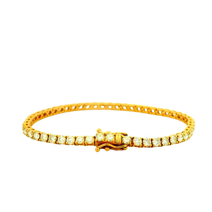 14k Yellow Gold 5.72ctw Natural Round Brilliant Diamond Tennis Bracelet — worn on the wrist