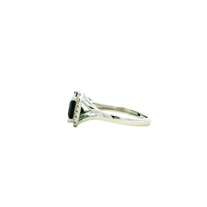 14k White Gold 3.54ct Emerald Cut Blue Tourmaline and 0.27ctw Diamond Halo Ring — worn on the finger