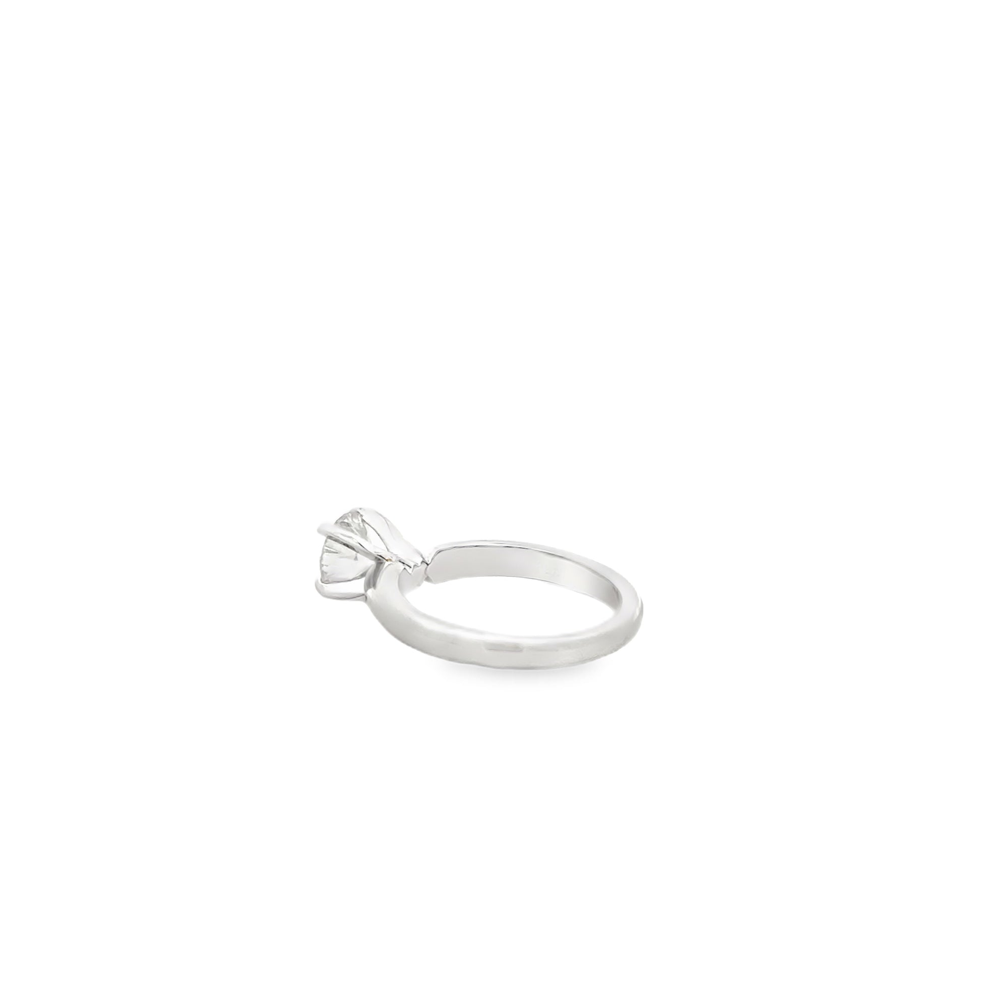 Platinum 0.75ct Round Brilliant Diamond Solitaire Engagement Ring — worn on the finger