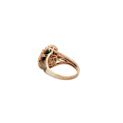 14k White and Rose Gold Le Vian Deep Sea Blue Topaz Oval Halo Ring — worn on the finger