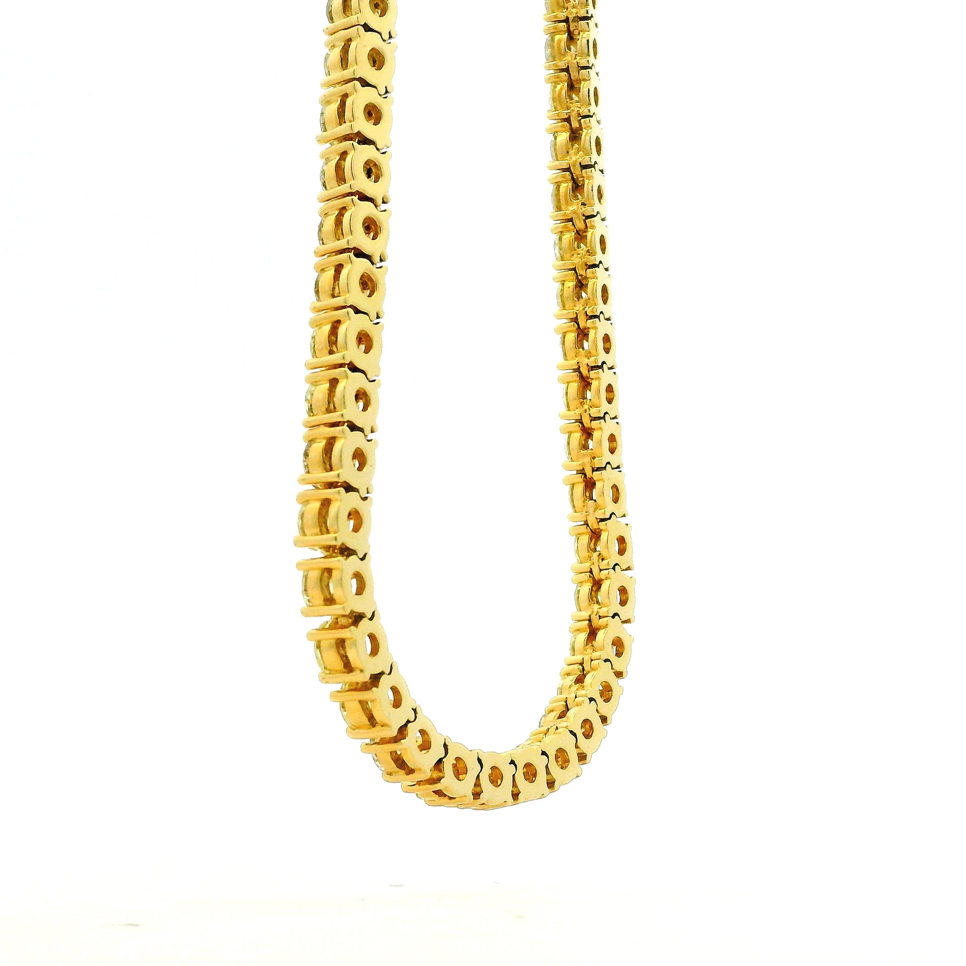 14k Yellow Gold 35.45ctw Round Diamond 4-Prong Tennis Necklace 22" — worn at the neckline