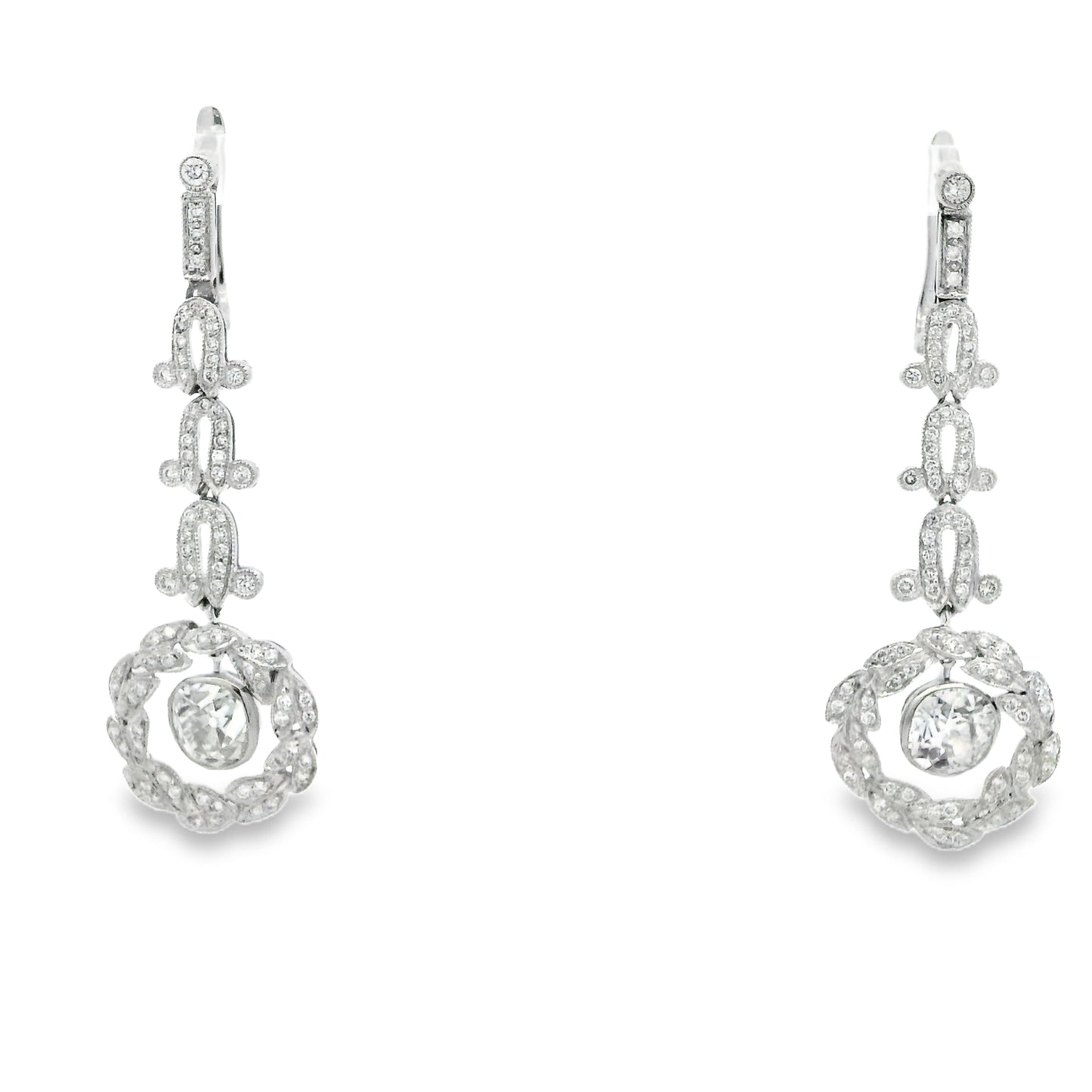 Platinum 3.88ctw Antique Cushion Cut Natural Diamond Dangle Earrings — worn on the ear