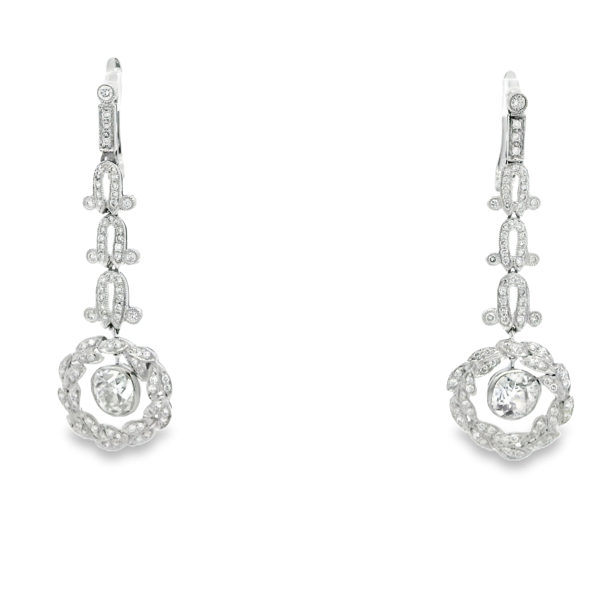 Platinum 3.88ctw Antique Cushion Cut Natural Diamond Dangle Earrings — worn on the ear