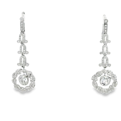 Platinum 3.88ctw Antique Cushion Cut Natural Diamond Dangle Earrings — worn on the ear