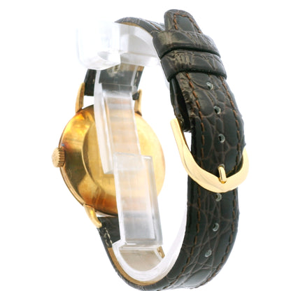 Patek Philippe Calatrava 18k Yellow Gold 35mm Champagne Dial Vintage Watch — worn on the wrist