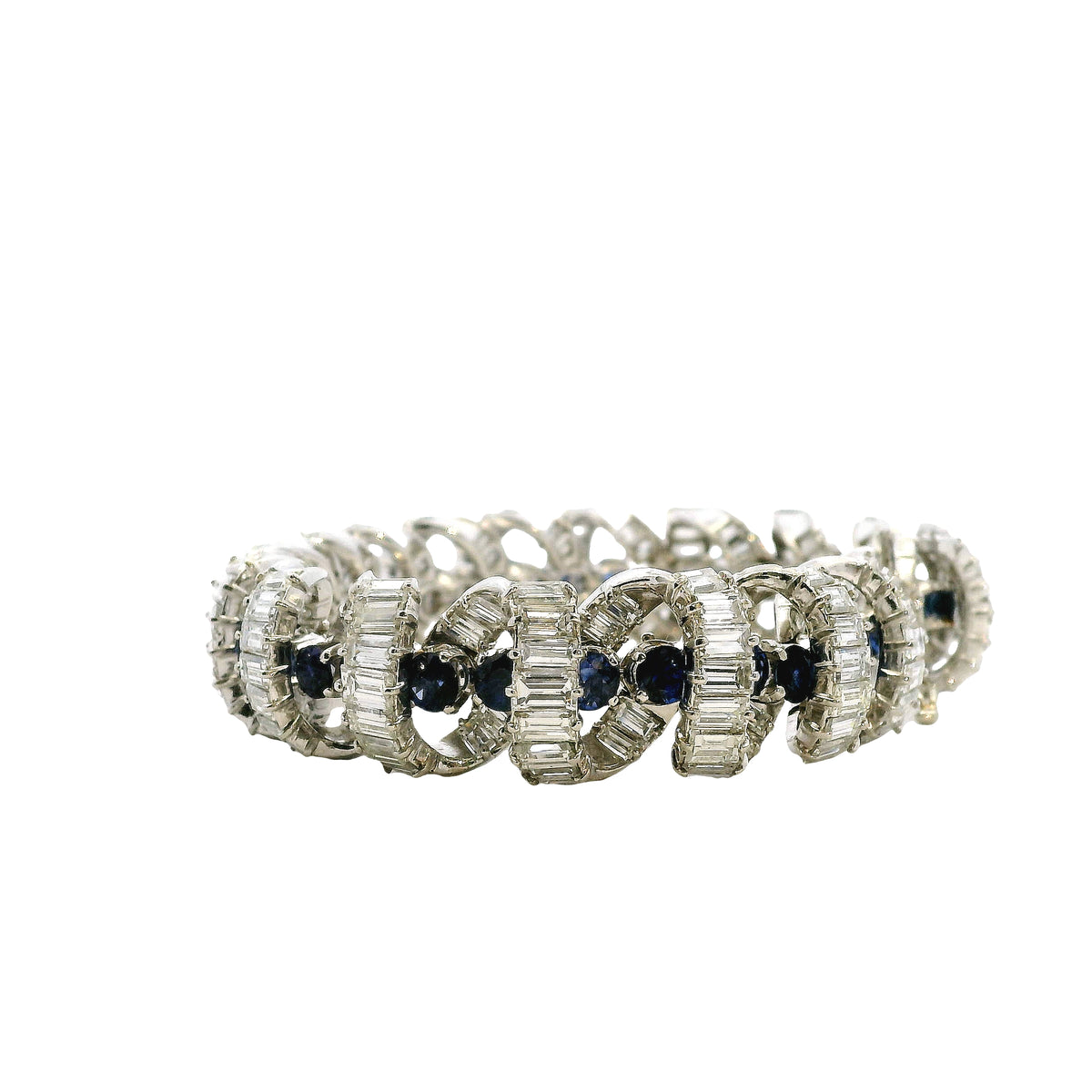 Platinum 25ctw Baguette Cut Diamond and Natural Blue Sapphire Interlocking Link Statement Bracelet — worn on the wrist
