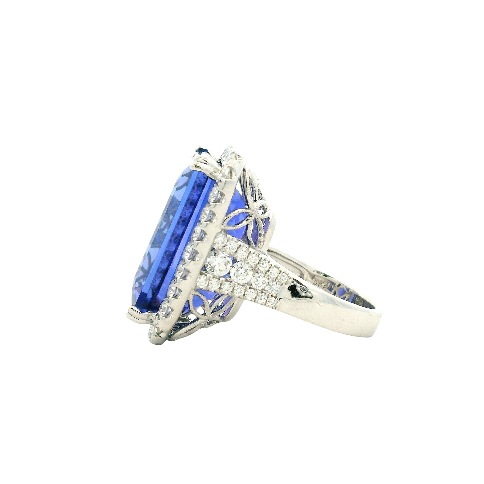 18k White Gold 34.72ct Emerald Cut Tanzanite and 2.26ctw Diamond Halo Cocktail Ring — worn on the finger