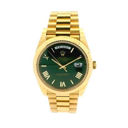 Rolex 228238 Day-Date 40 40mm Green Roman Dial 18k Yellow Gold Watch — worn on the wrist