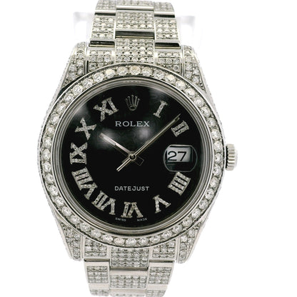 Luxury watch with diamond-studded case and black dial on a white background