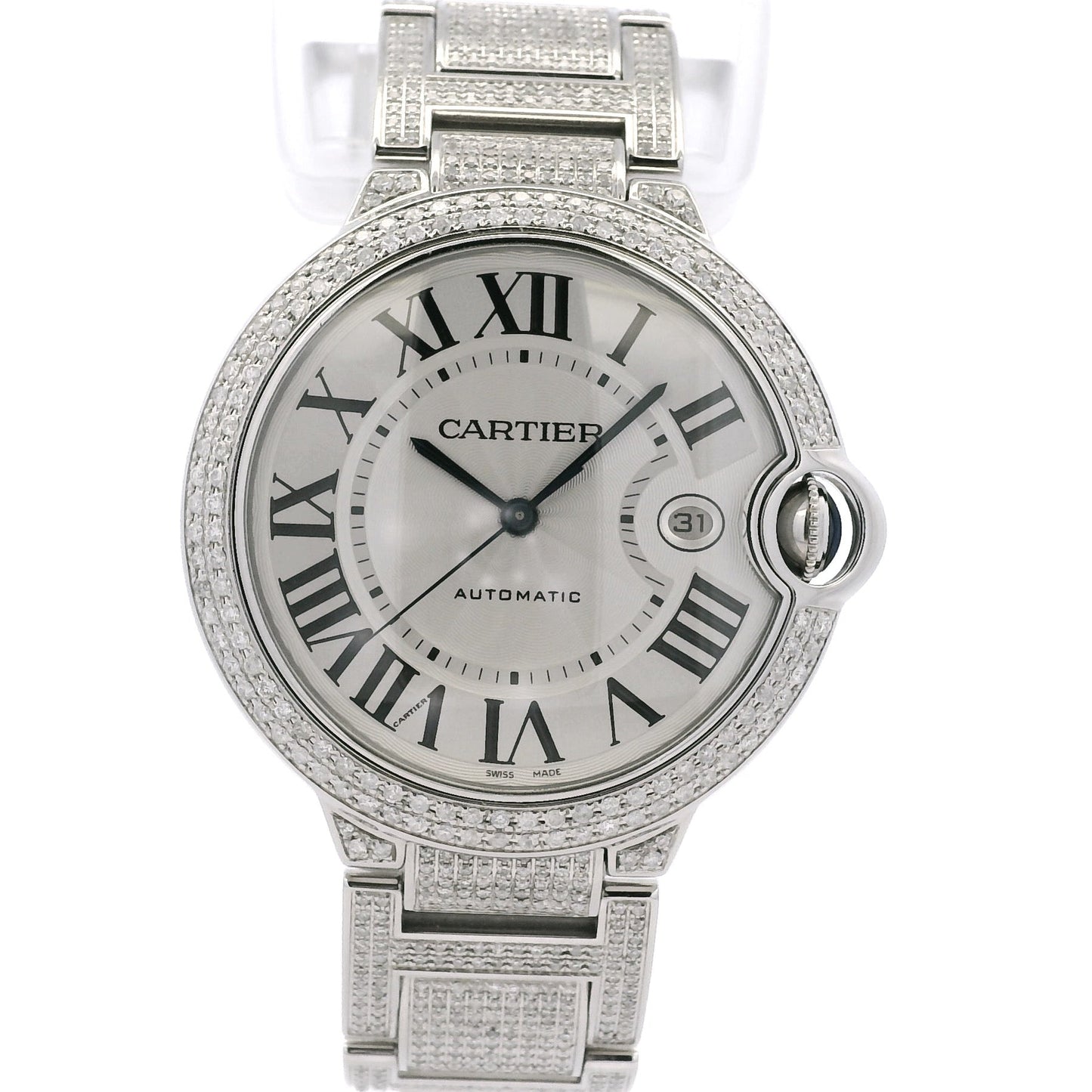 Silver Cartier watch with diamond-studded bezel on a white background