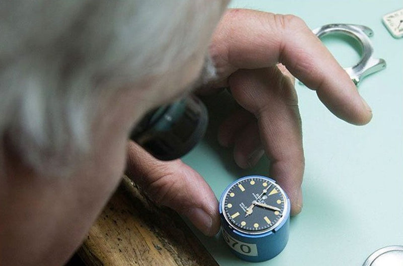 Close-up of a luxury watch being repaired by a technician – watch repair cost explained