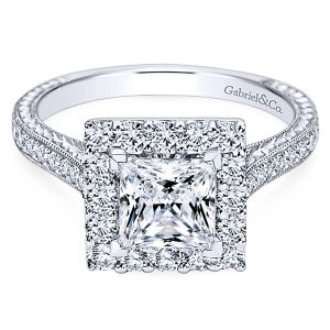 Portrait halo ring with two wedding bands on top and bottom for balance