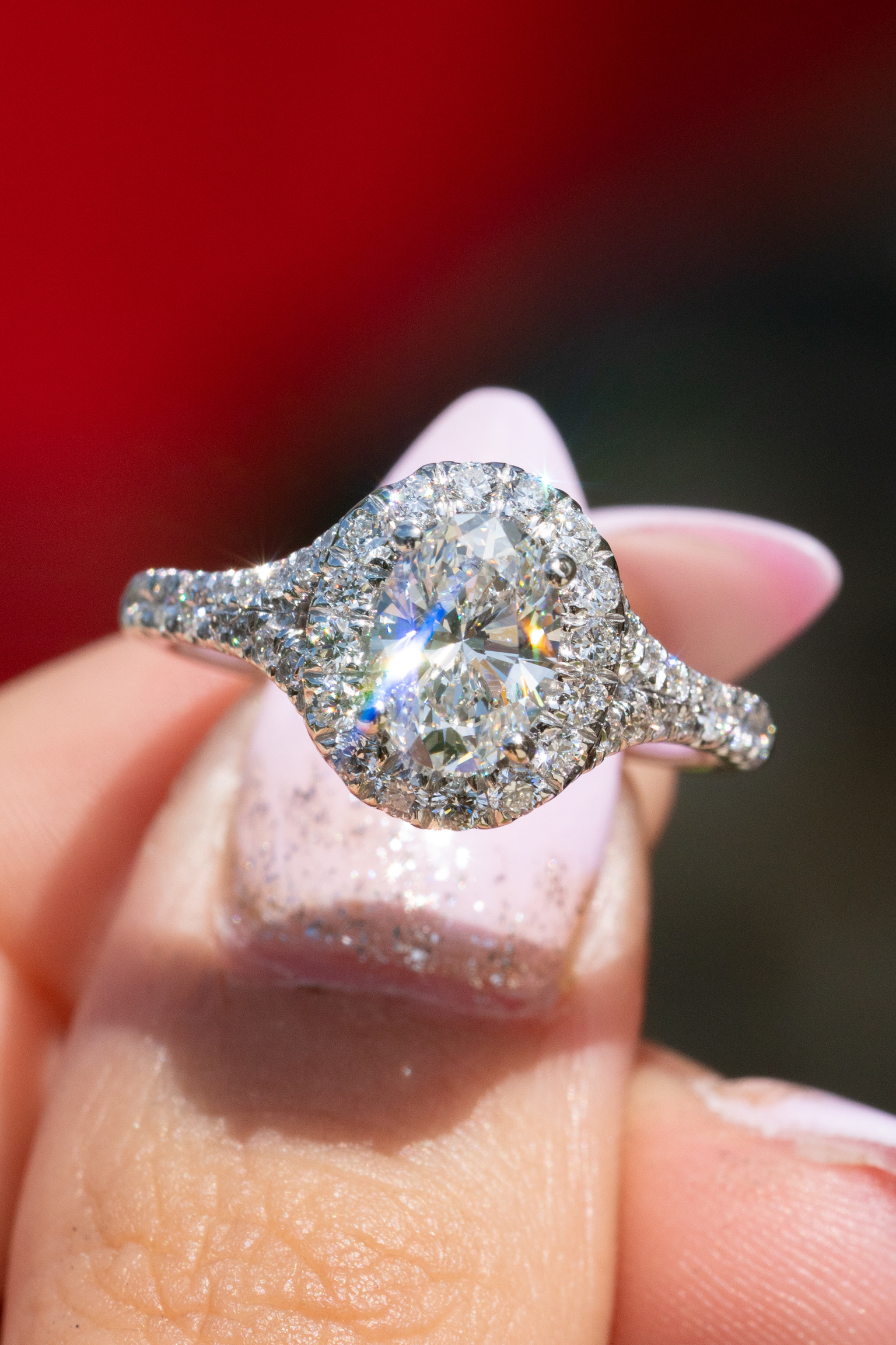Oval cut diamond halo ring