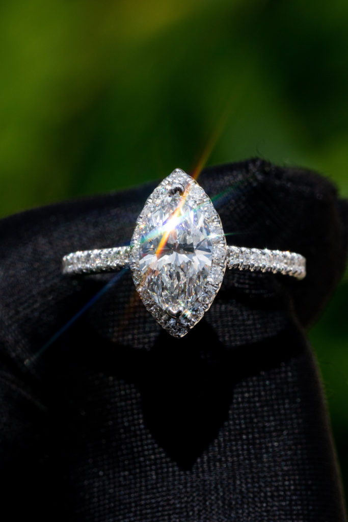 close up of an oval engagement ring set