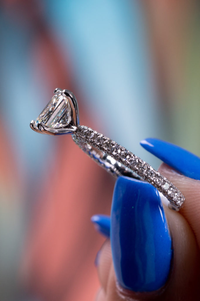a cushion-cut diamond in an engagement ring