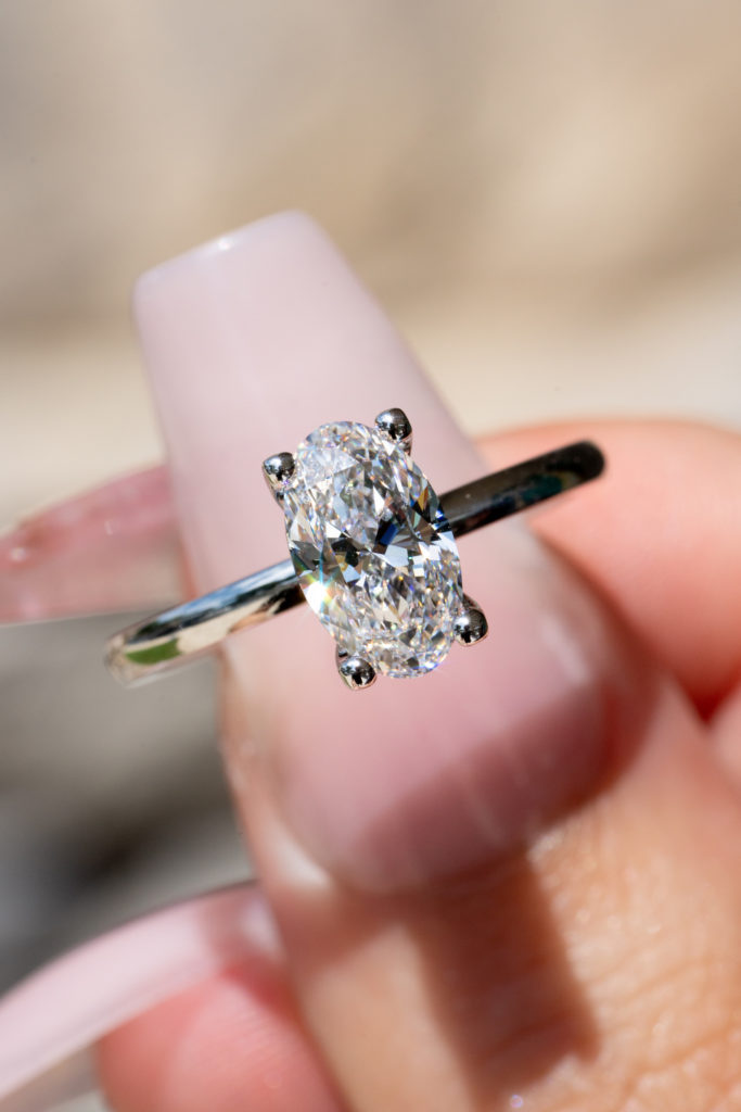 an oval engagement ring with a prong setting