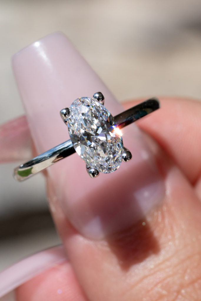 an engagement ring with a prong setting
