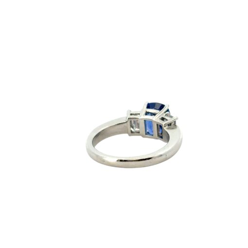 Platinum 3 Stone Ring set with Natural Cushion Blue Sapphire and Emerald Cut Diamond Side Stones - Image 15